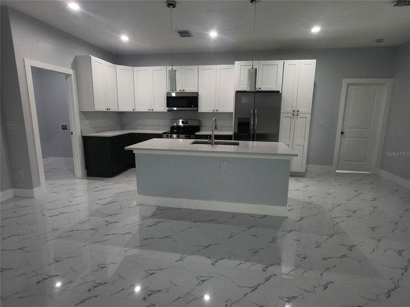 Furnished interior view inside a new home in , Port Charlotte (Image 17).