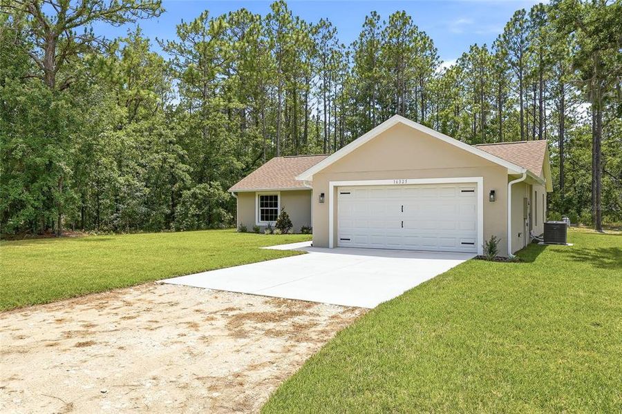 Front exterior of a new home in , Brooksville, FL, highlighting curb appeal (Image 25). Front exterior of a new home in , Brooksville, FL, highlighting curb appeal (Image 25).