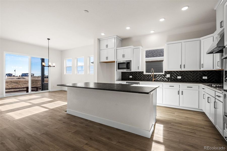 Furnished interior view inside a new home in Wolf Ranch - Enclave Collection, Colorado Springs (Image 13).