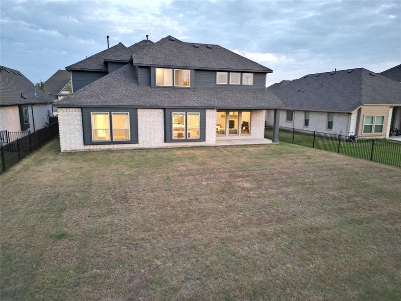 Exterior details and patio area of a home in Abe's Landing, Granbury (Image 21).
