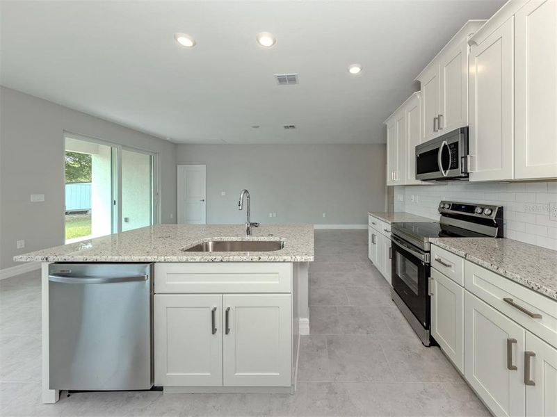 Furnished interior view inside a new home in , North Port (Image 12).