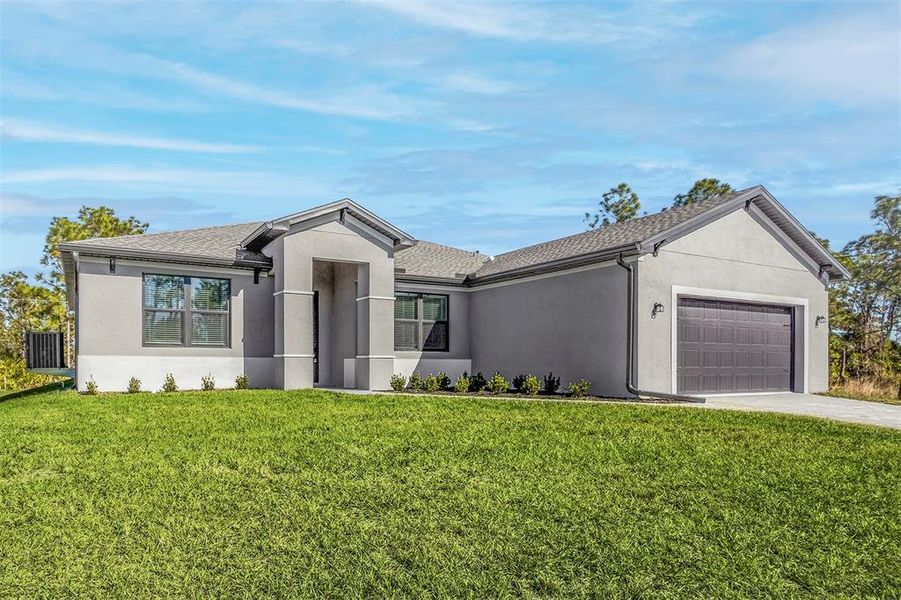 Front exterior of a new home in , Port Charlotte, FL, highlighting curb appeal (Image 1).
