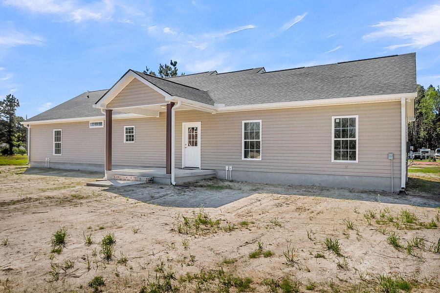 Exterior details and patio area of a home in , Round O (Image 24).