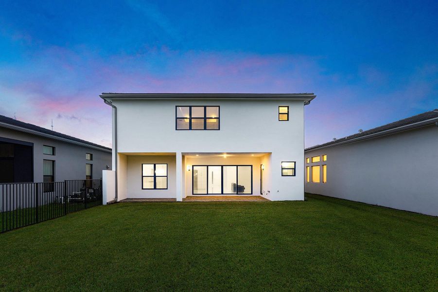 Front exterior of a new home in Lotus Edge, Boca Raton, FL, highlighting curb appeal (Image 39).