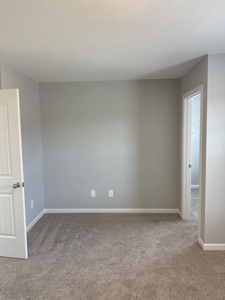 secondary bedroom with an extended space