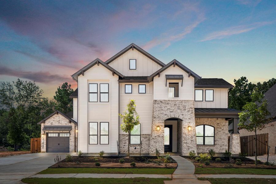 Front exterior of a new home in Colton, Montgomery, TX, highlighting curb appeal (Image 2).