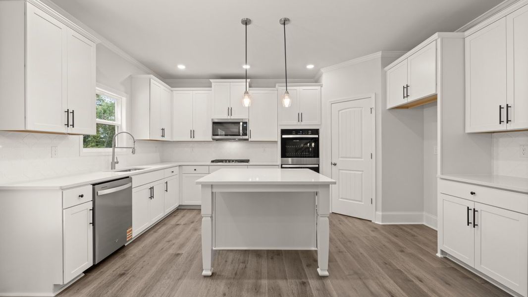 Representative furnished interior of a home built from the Grayson by D.R. Horton in Holland Estates, Powder Springs (Image 5).