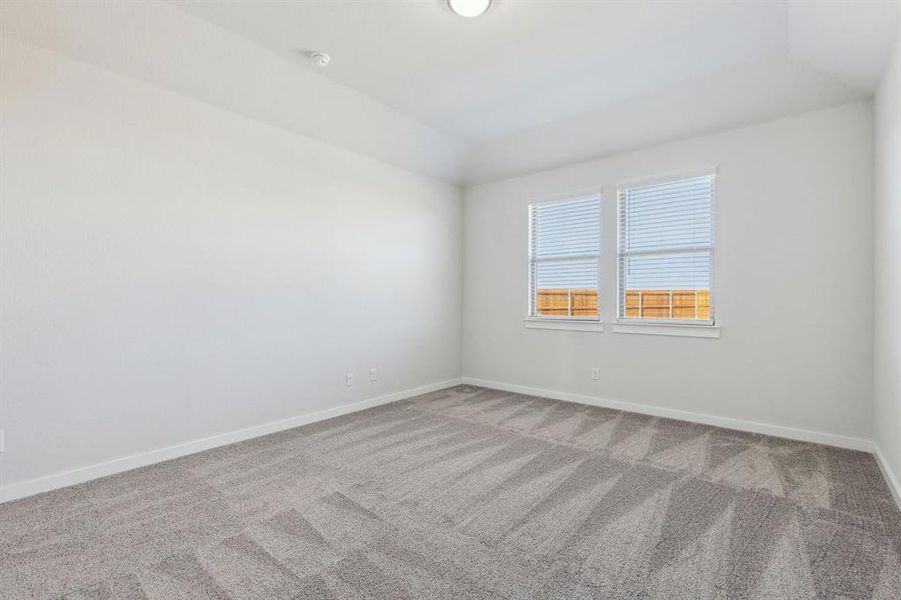 Primary suite in the Willow home plan by Trophy Signature Homes – REPRESENTATIVE PHOTO