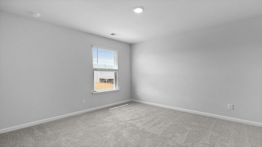 Spacious, unfurnished interior of a new home in Pine Hills at Cane Bay, Summerville (Image 23). Spacious, unfurnished interior of a new home in Pine Hills at Cane Bay, Summerville (Image 23).