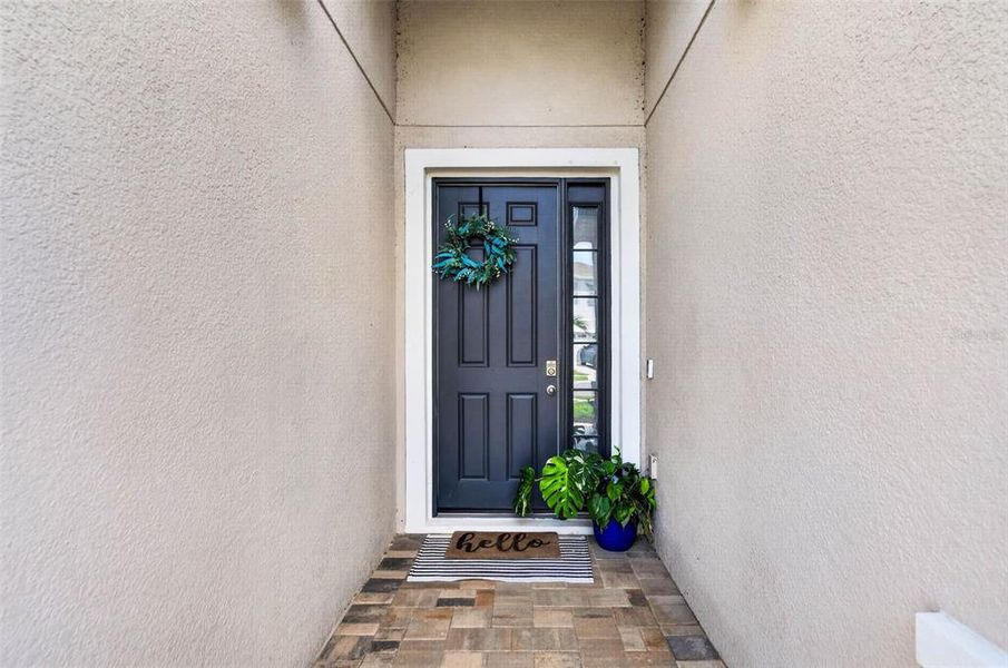 Exterior details and patio area of a home in Bella Lago, Parrish (Image 3).