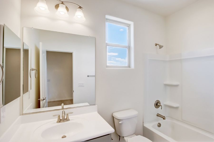 Representative furnished interior of a home built from the Castillo Series - Bluebell by Brightland Homes in Castillo at Anderson Parc, Buckeye (Image 7).