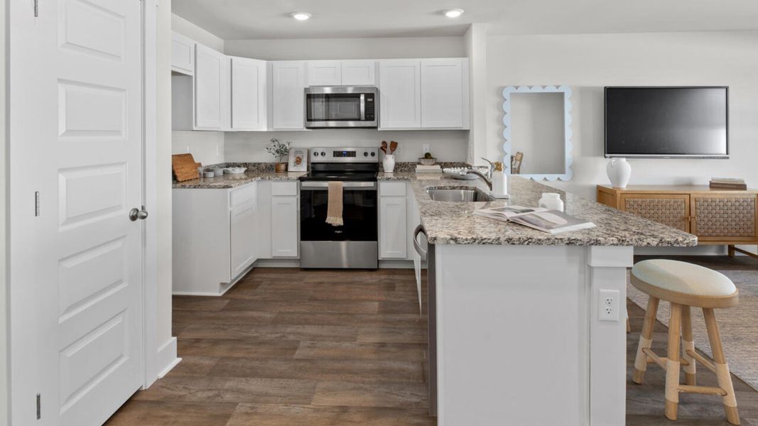 Furnished interior view inside a new home in Waterside Townhomes, Surf City (Image 8).