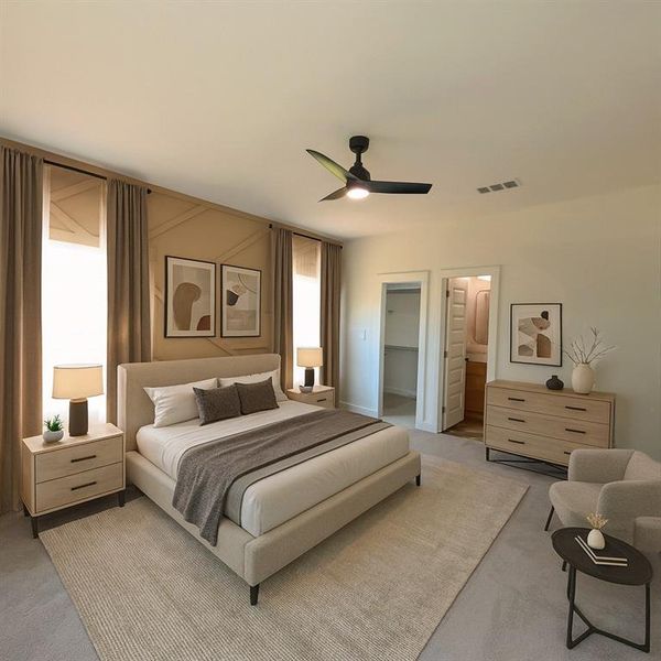 Carpeted bedroom with a walk in closet, a ceiling fan, and ensuite bathroom Carpeted bedroom with a walk in closet, a ceiling fan, and ensuite bathroom