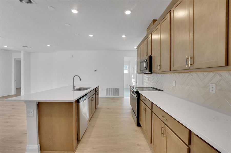 Furnished interior view inside a new home in Green Key Village, Lady Lake (Image 19).