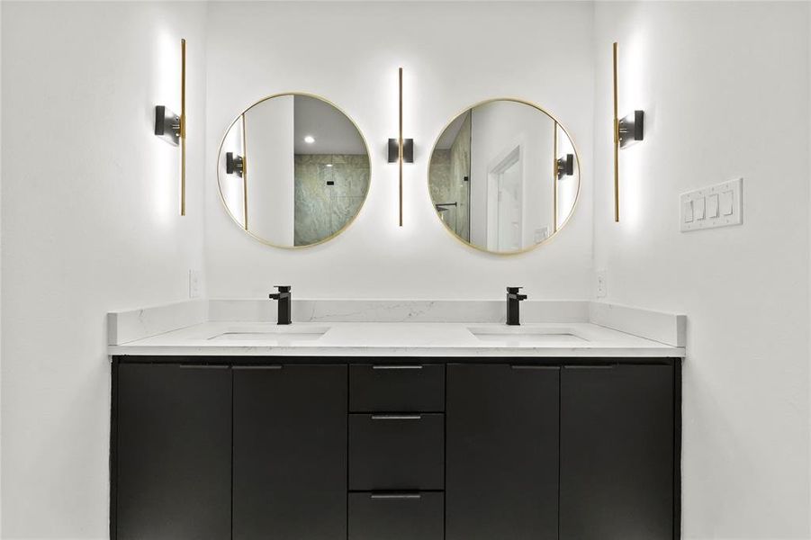 Full bath with double vanity and walk in shower