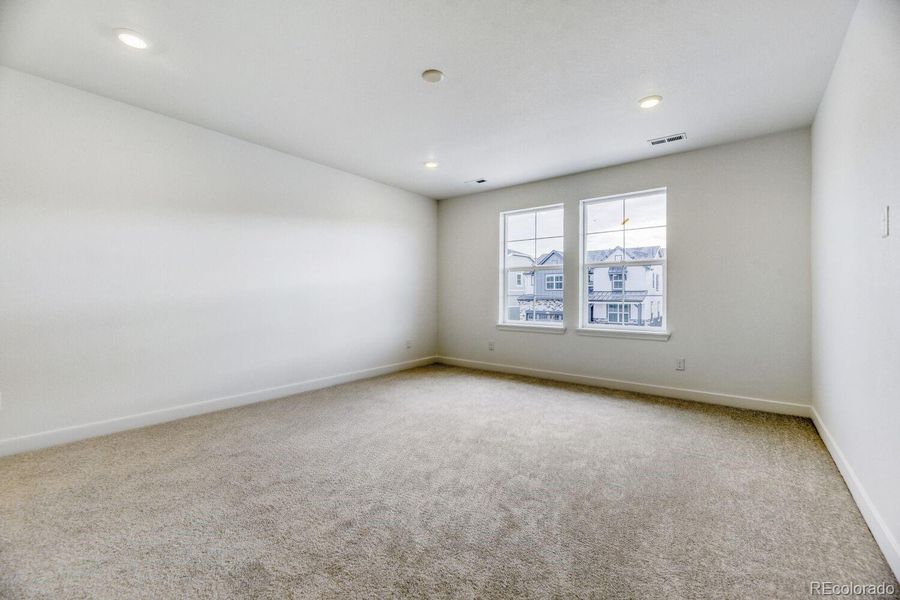 Spacious, unfurnished interior of a new home in Newlin Crossing, Parker (Image 20).