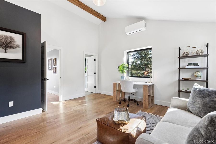 Loft suite with living area, office space, private bedroom and bathroom Loft suite with living area, office space, private bedroom and bathroom