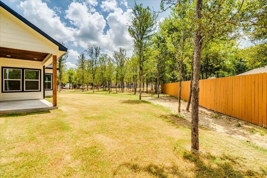 Exterior details and patio area of a home in , Bastrop (Image 30).
