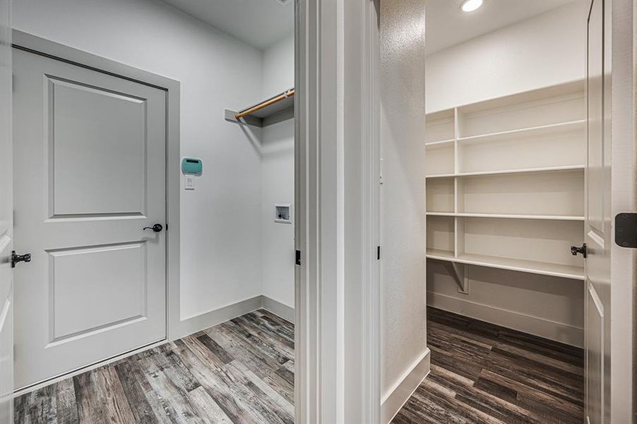 laundry room with view of pantry