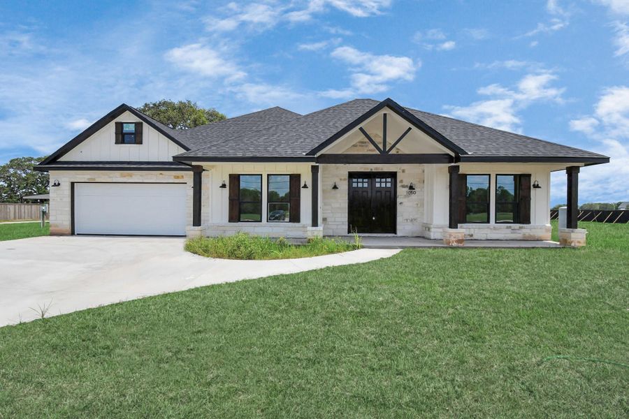 Front exterior of a new home in , Angleton, TX, highlighting curb appeal (Image 27).