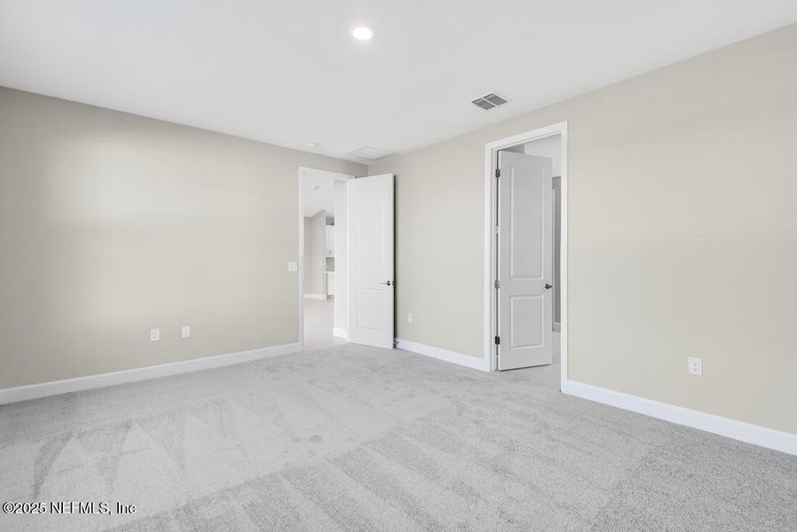 Spacious, unfurnished interior of a new home in Colbert Landings, Palm Coast (Image 39).