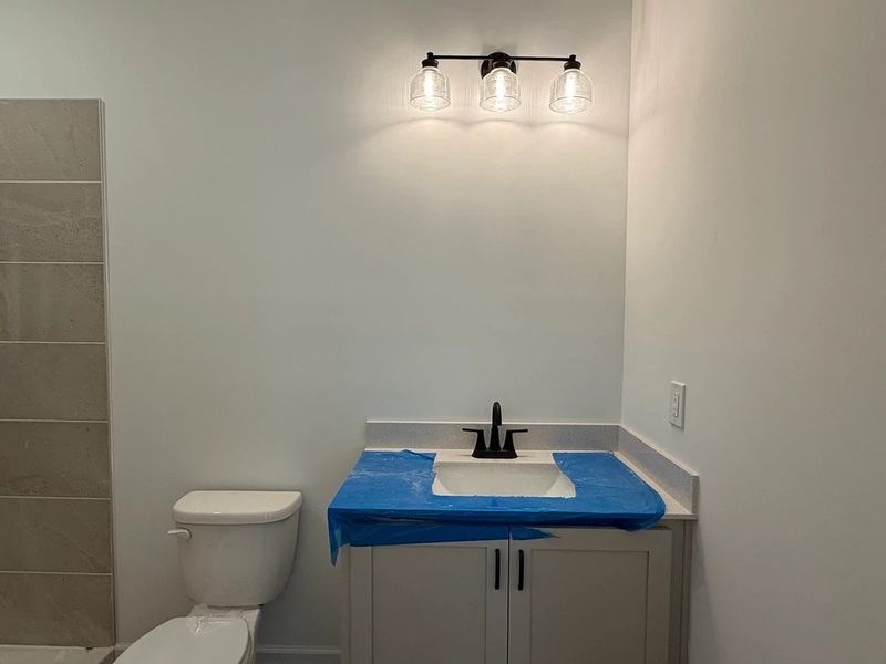 Guest Bath featuring the AW Collection® Artisan - A down-to-earth mix of texture and function. Guest Bath featuring the AW Collection® Artisan - A down-to-earth mix of texture and function.