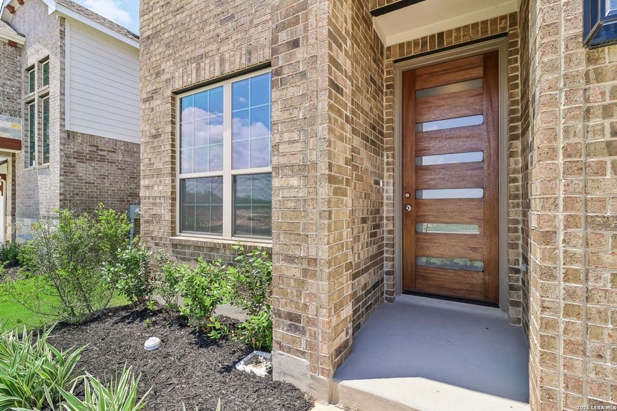 Exterior details and patio area of a home in Stream Waters, Seguin (Image 20).