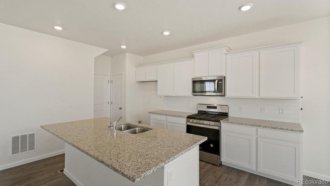 Furnished interior view inside a new home in Prairie Song, Windsor (Image 9).