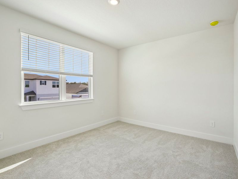 Spacious, unfurnished interior of a new home in Magnolia Bay - Reserve Series, Nokomis (Image 20).
