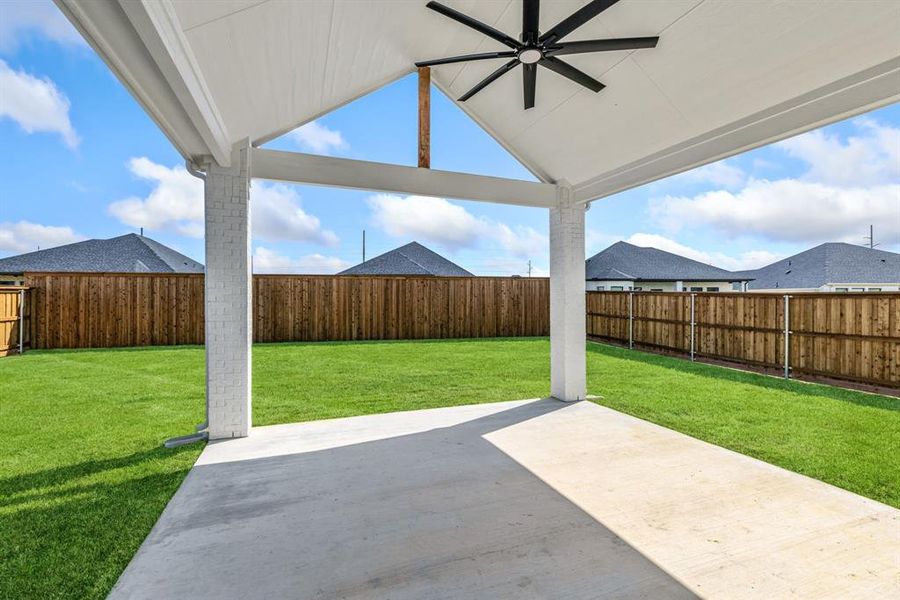 Exterior details and patio area of a home in University Park at Northpointe, Denton (Image 26).