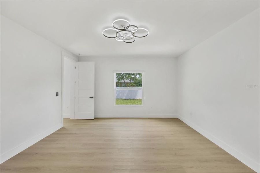 Spacious, unfurnished interior of a new home in , Port Charlotte (Image 32).