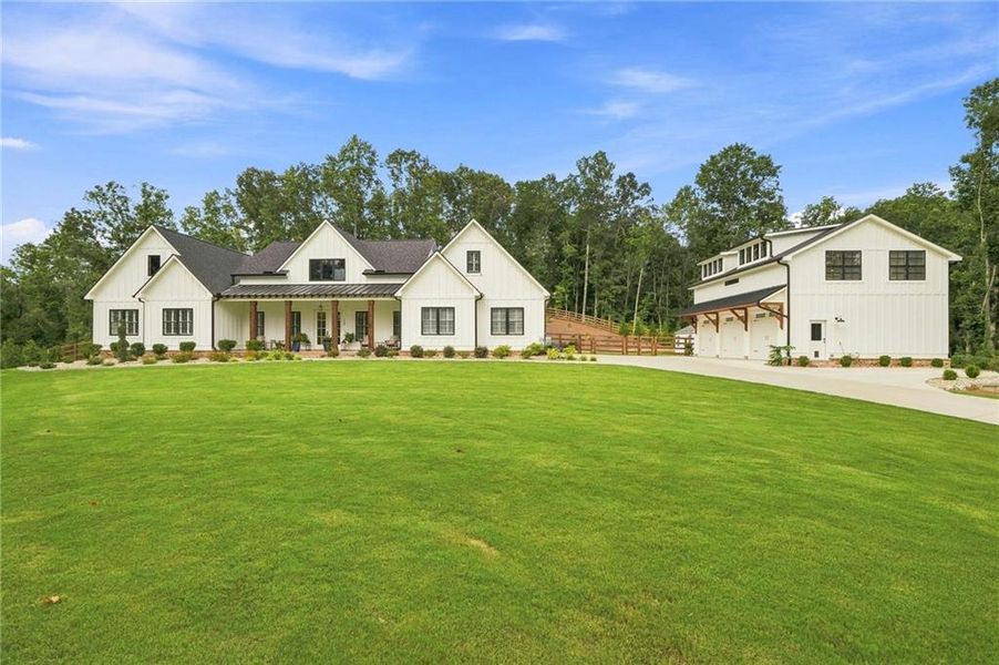 Front exterior of a new home in , Ball Ground, GA, highlighting curb appeal (Image 26). Front exterior of a new home in , Ball Ground, GA, highlighting curb appeal (Image 26).