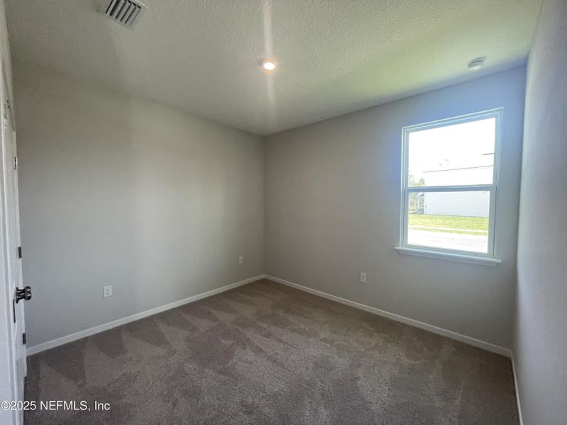 Spacious, unfurnished interior of a new home in Magnolia Series at Seminole Palms, Palm Coast (Image 27).