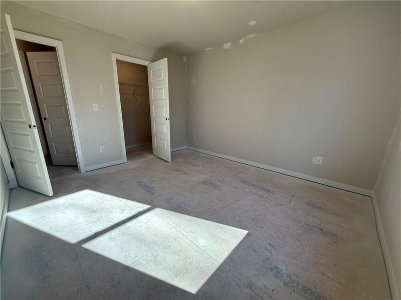 In-progress construction of a new home in The Towns at Auburn Station East, Auburn, GA (Image 16).