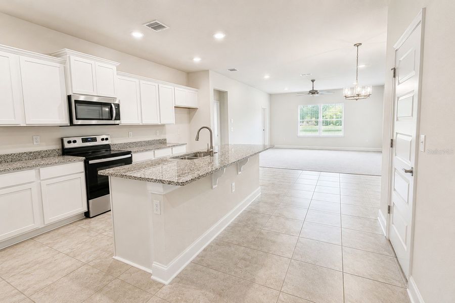 Furnished interior view inside a new home in Harmony Central, St. Cloud (Image 6).