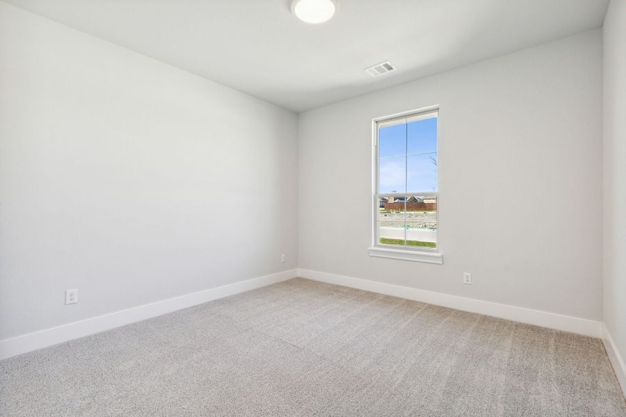 Representative unfurnished interior of a home built from the Cardinal by Centre Living Homes in Dove Hollow, Waxahachie (Image 24).