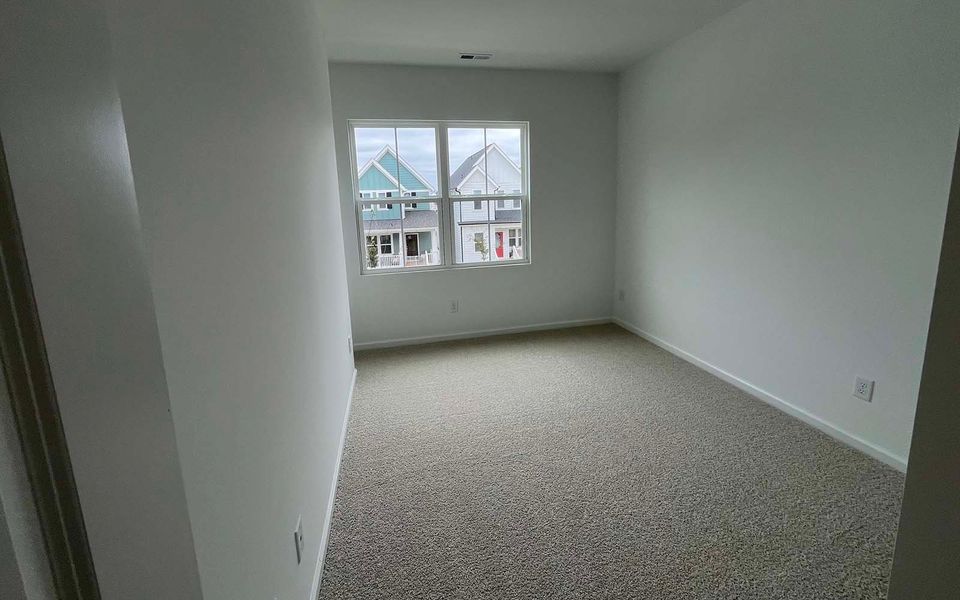 Spacious, unfurnished interior of a new home in Townhomes at Wendell Falls, Wendell (Image 14).