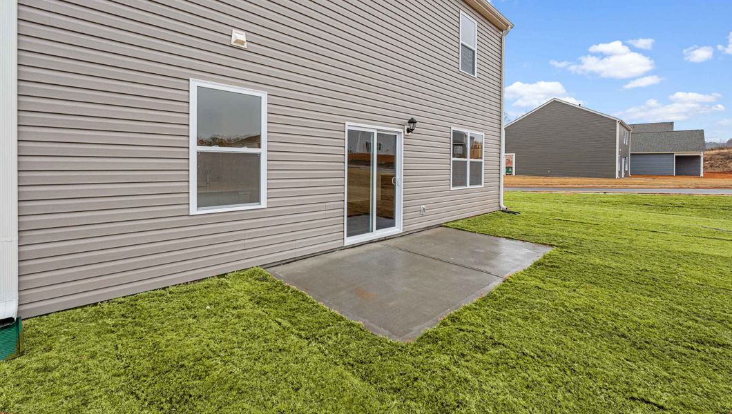 Exterior details and patio area of a home in Hunters Ridge, Woodruff (Image 3).