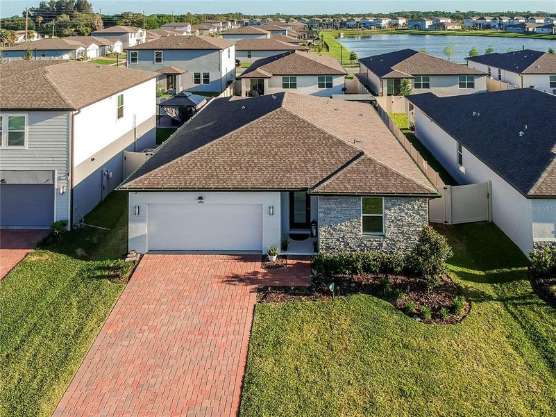 Front exterior of a new home in , St. Cloud, FL, highlighting curb appeal (Image 23).