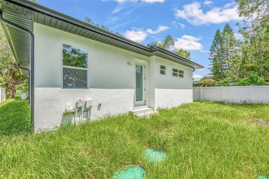 Front exterior of a new home in , Tampa, FL, highlighting curb appeal (Image 22).