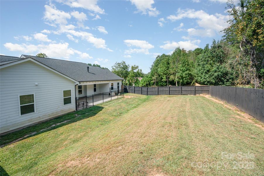 Exterior details and patio area of a home in , Statesville (Image 29).