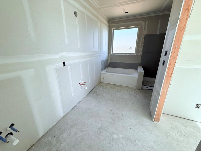 Double sink vanity in primary bathroom