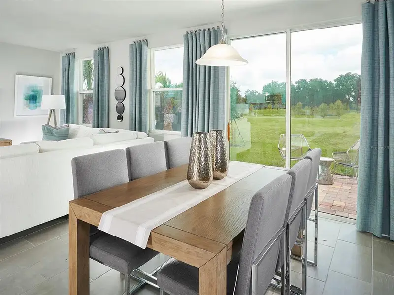 Furnished interior view inside a new home in The Meadow at Crossprairie Townes, St. Cloud (Image 4).