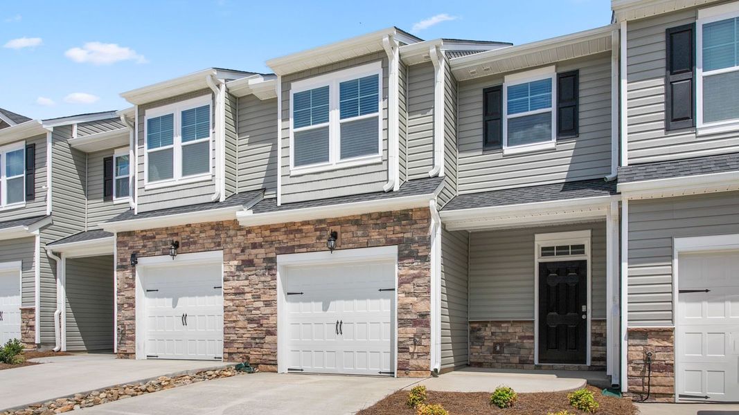 Exterior details and patio area of a home in The Grove at Glennview, Kernersville (Image 1).