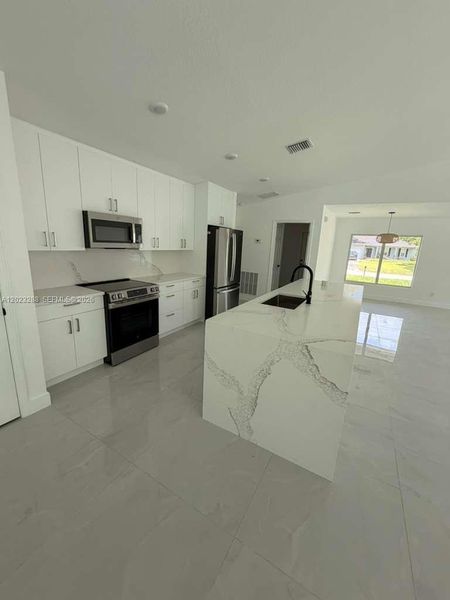 Furnished interior view inside a new home in , Vero Beach (Image 5).
