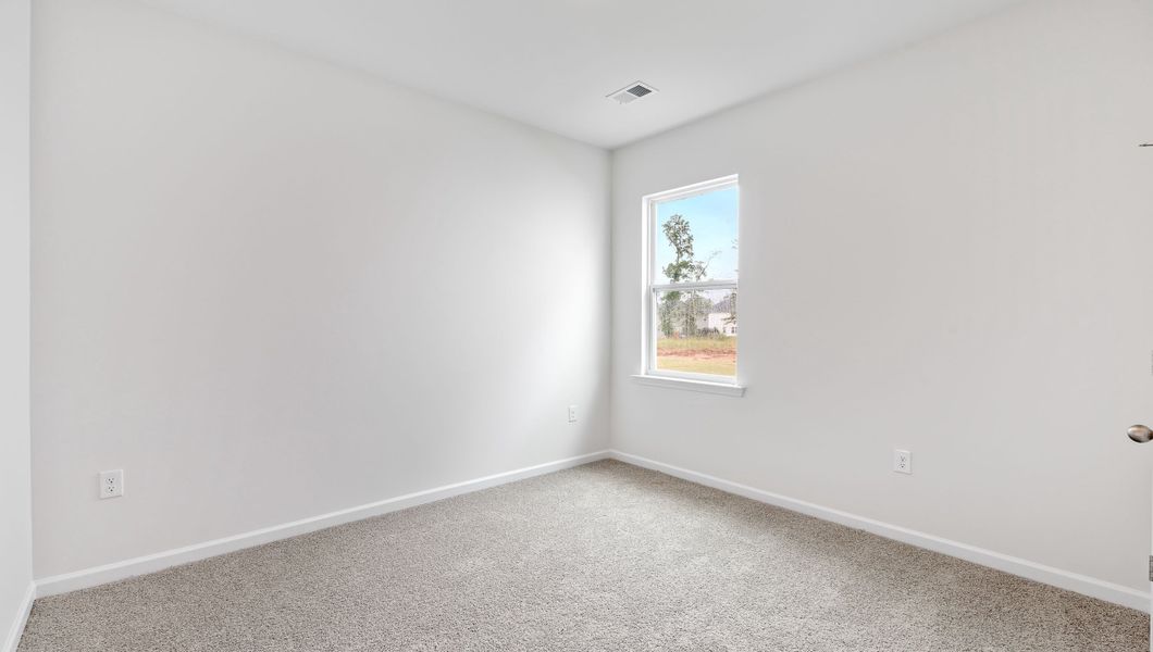 Spacious, unfurnished interior of a new home in Chestnut Ridge, Greenville (Image 13).