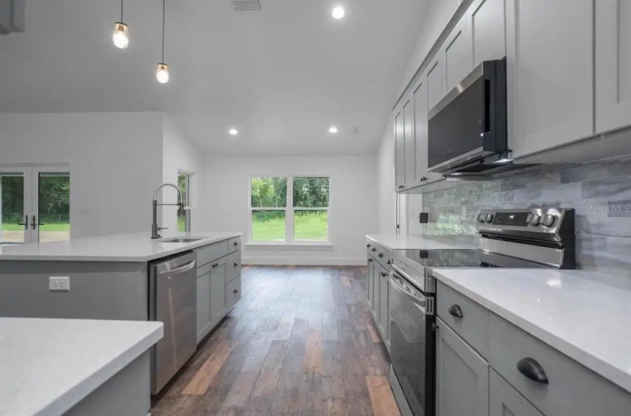Furnished interior view inside a new home in , Webster (Image 10).