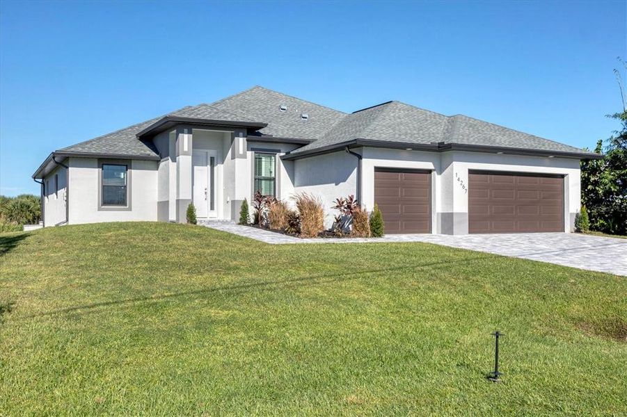 Front exterior of a new home in , Port Charlotte, FL, highlighting curb appeal (Image 1).