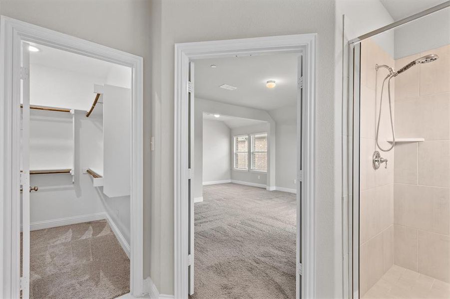 Bathroom with a shower with door