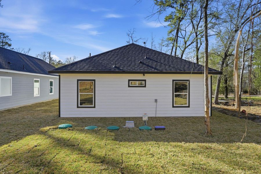 Exterior details and patio area of a home in , Willis (Image 21).